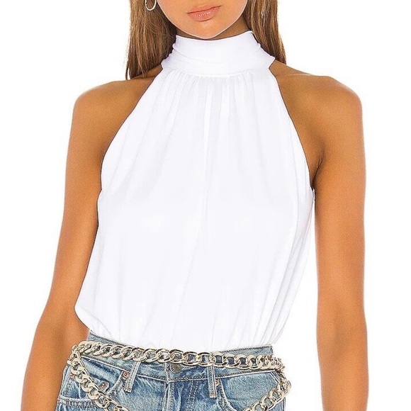 Mockneck white blouse with tie closure. - Picture 1 of 7